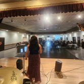 Rebel Rose playing at a private event